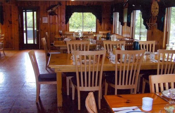 Dining area with long tables set up family style